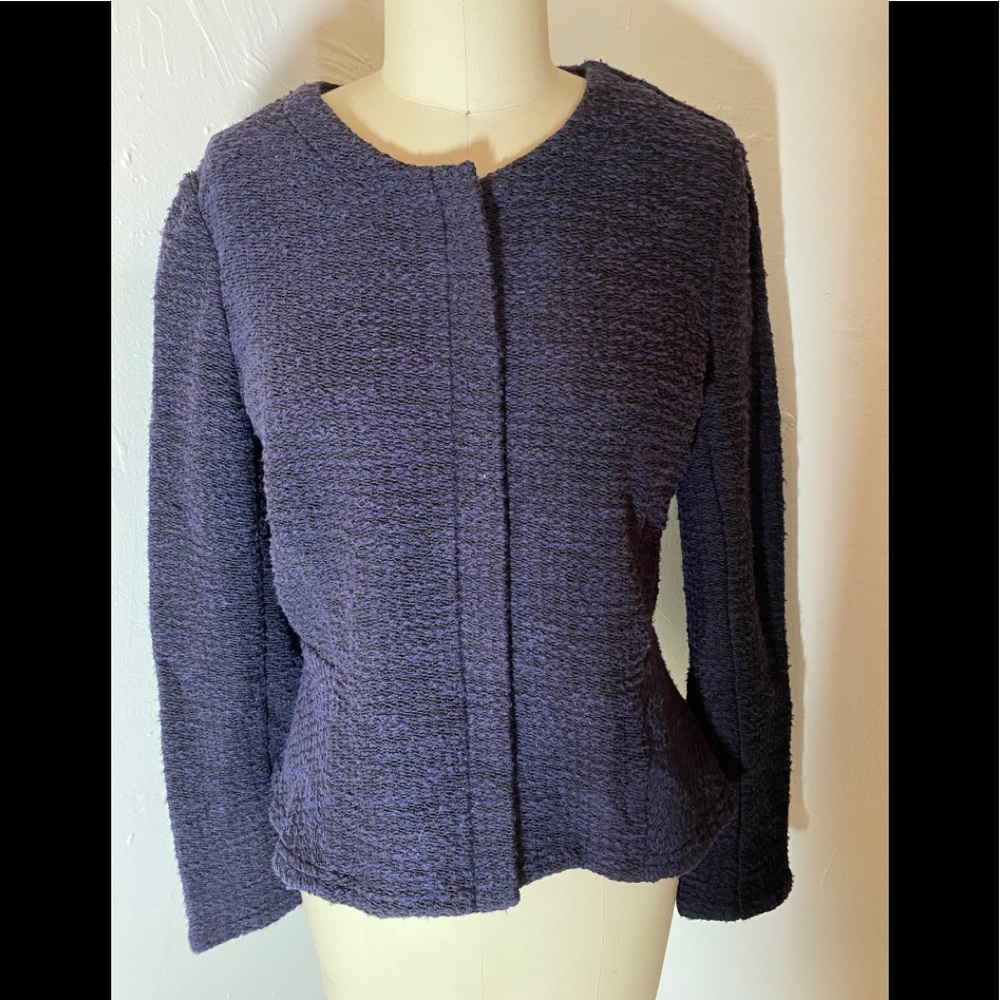 Anthropologie zipped peplum boucle jacket.